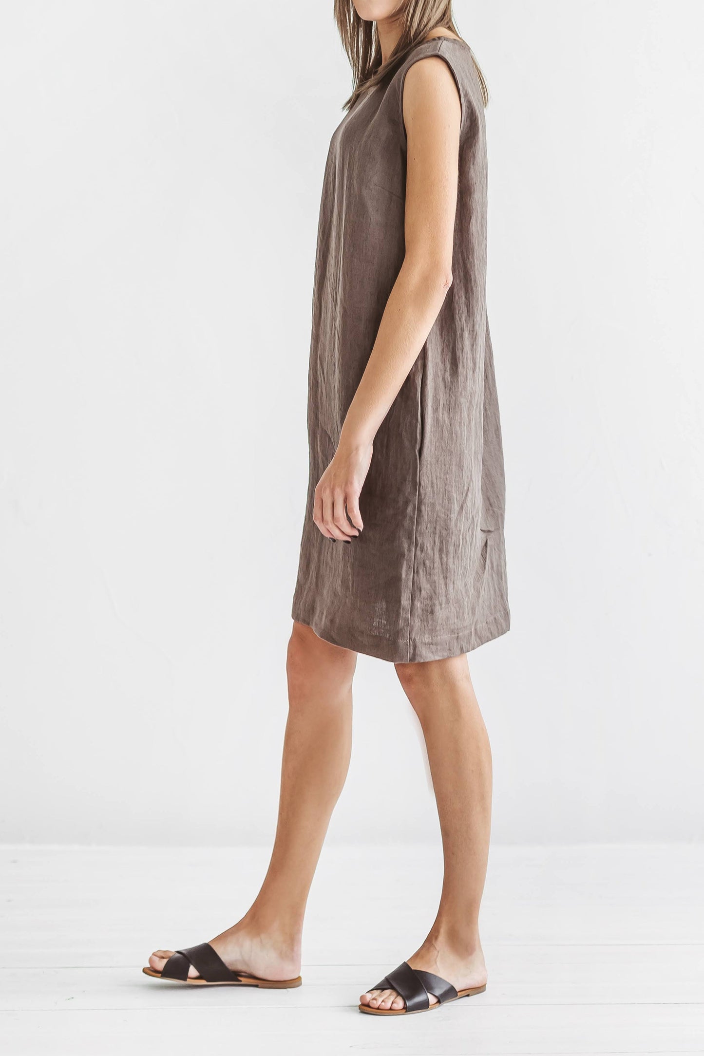 Daniela linen dress side closeup natural posture, handmade linen dress slow fashion