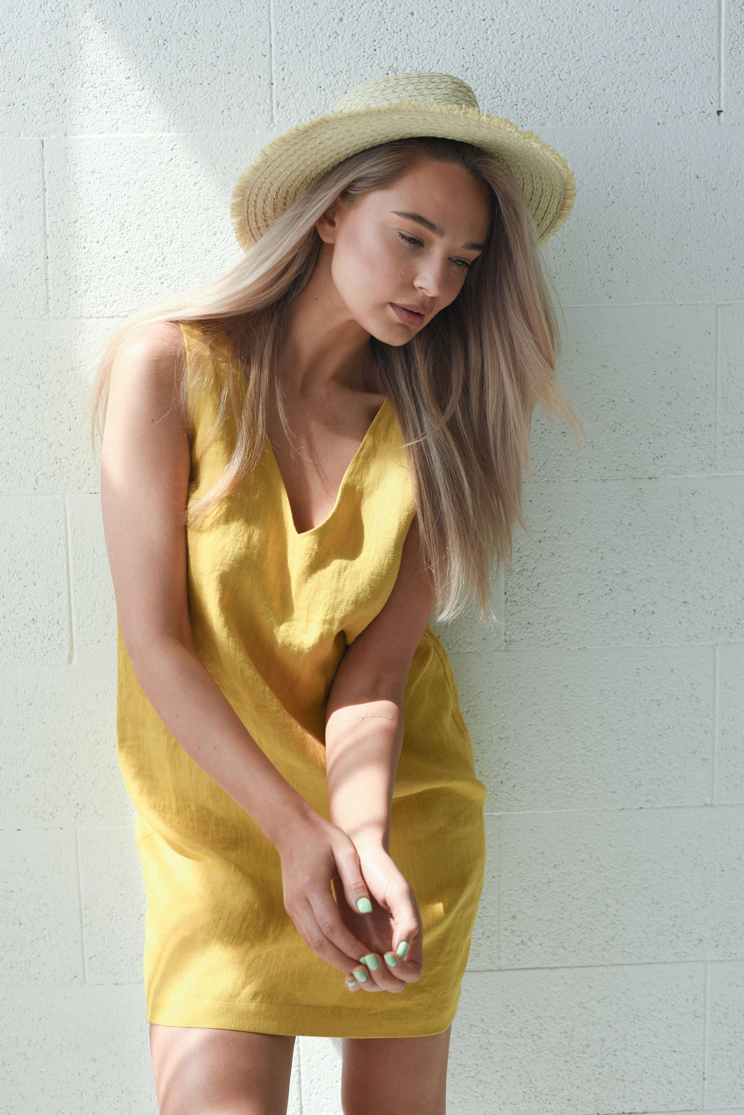 Ella linen dress close-up portrait look down, handmade linen dress slow fashion