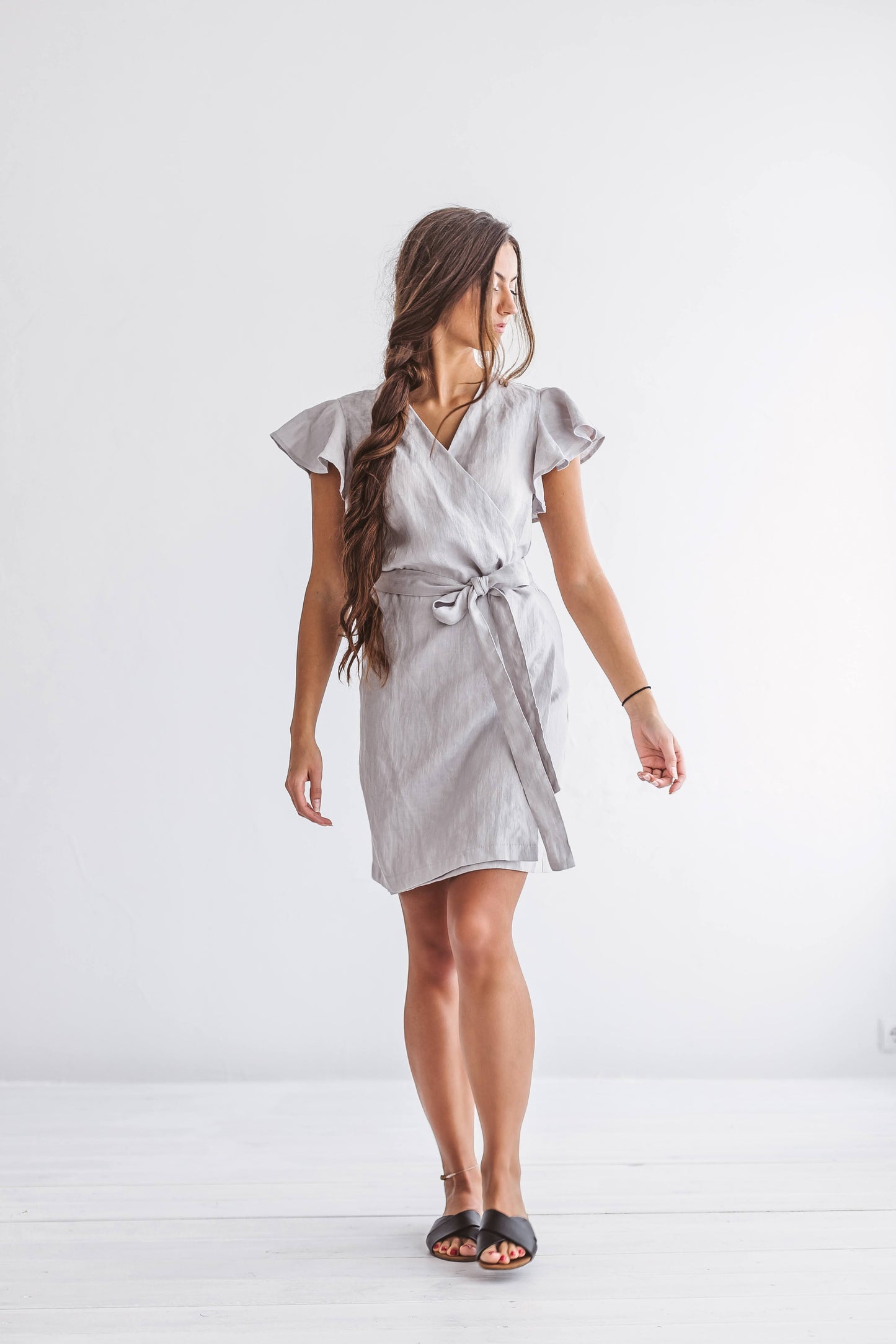AVA light grey linen wrap dress front walking view handmade linen dress slow fashion
