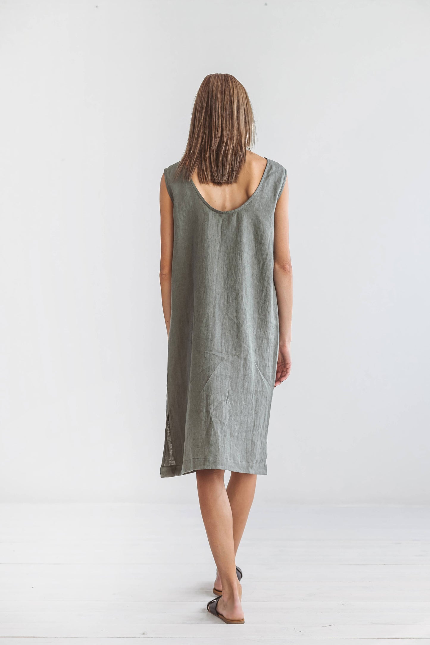 AVERY khaki linen midi dress walking front view handmade linen dress slow fashion