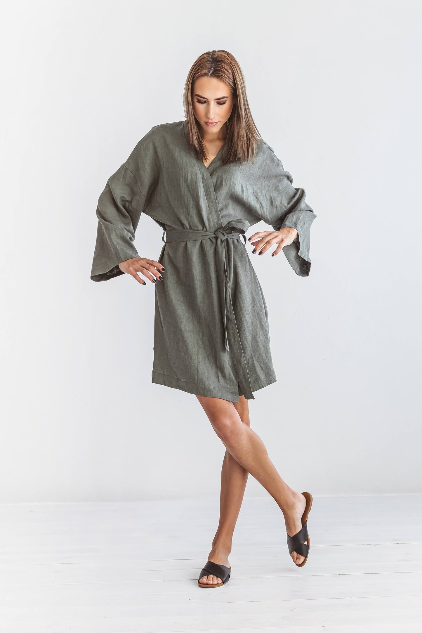 Khaki linen robe in natural light showing soft fabric, handmade linen robe slow fashion