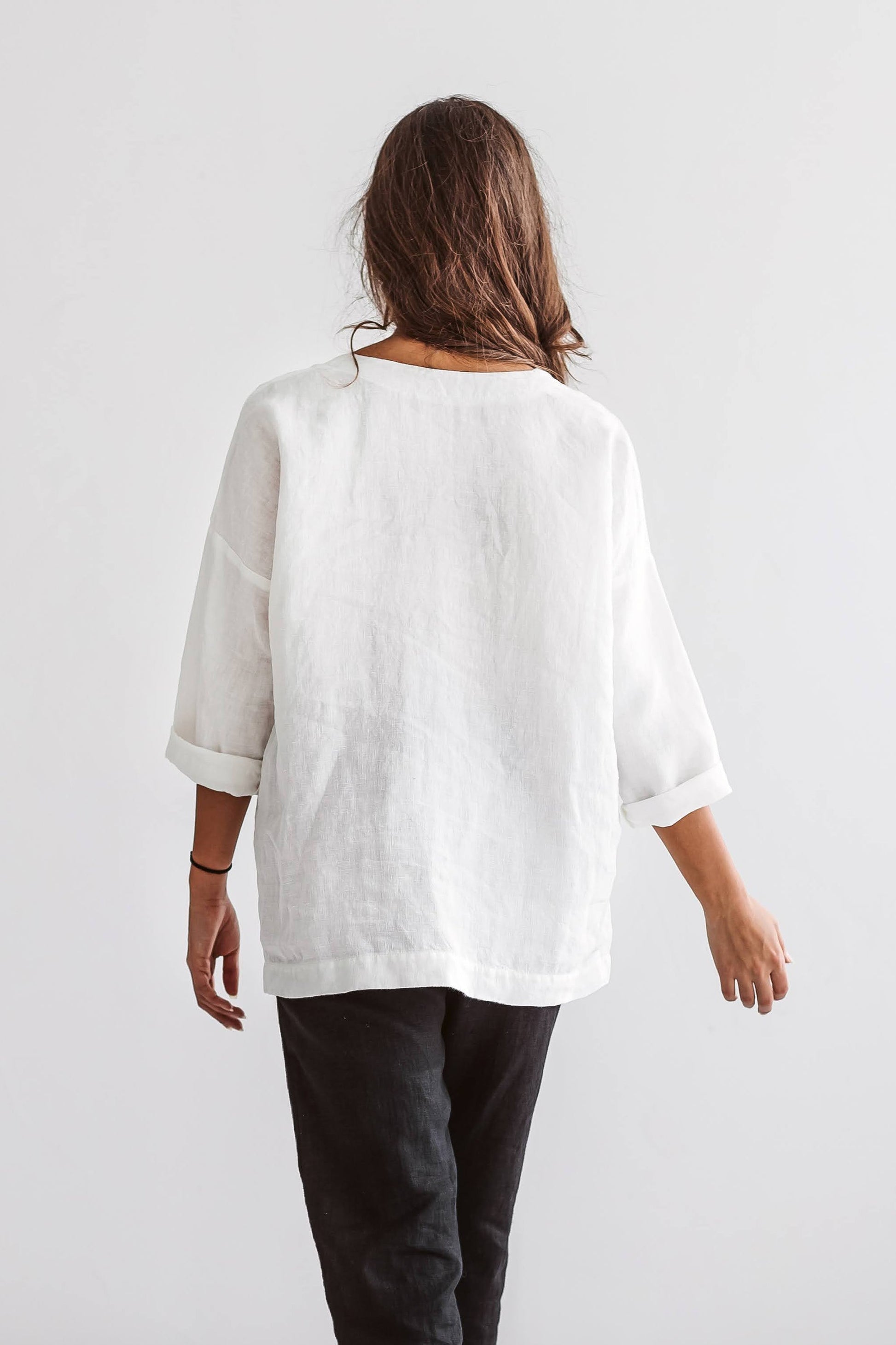 Camilla linen top back full body studio minimalist view