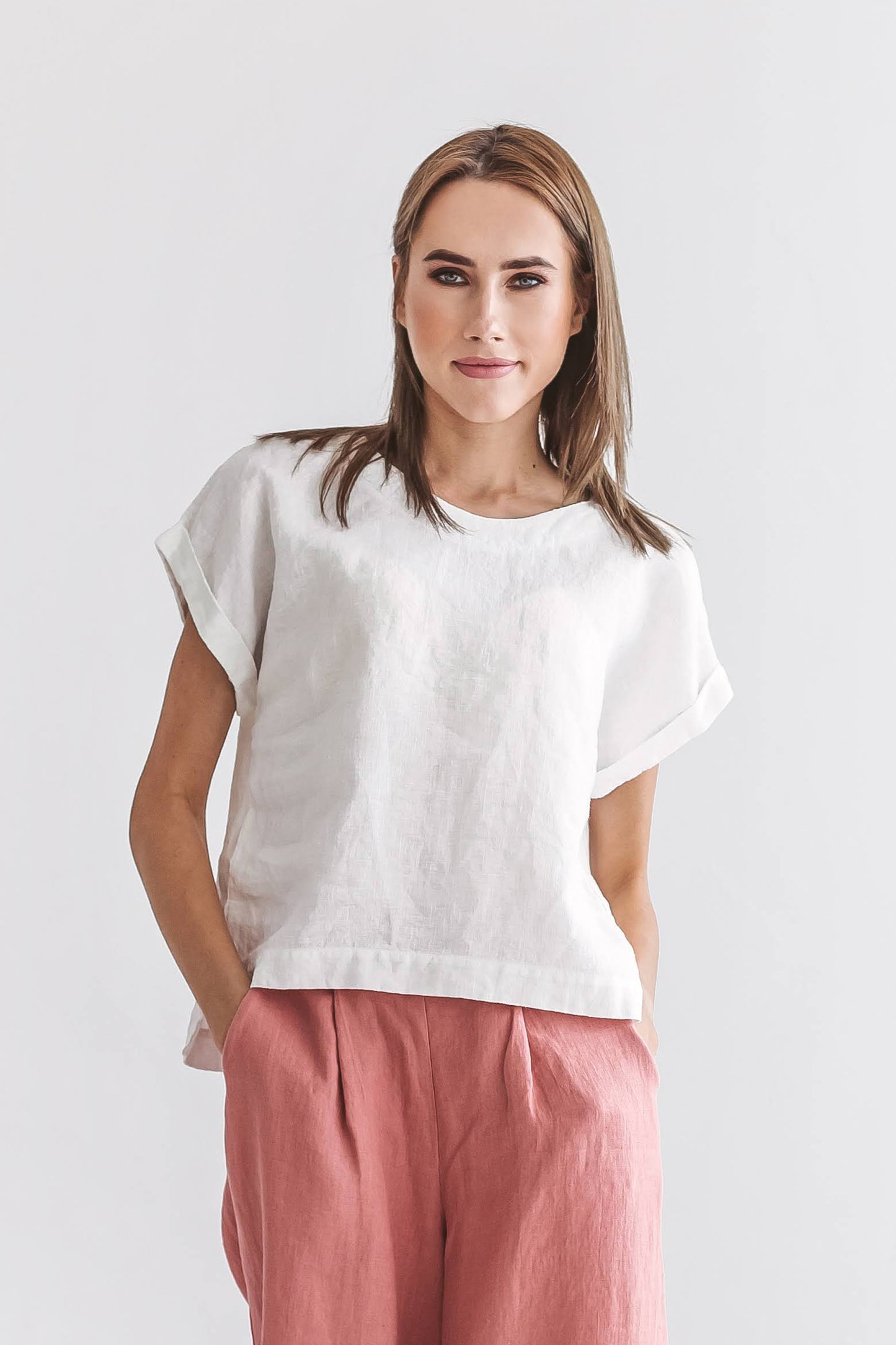 Debra linen top turned pose with linen pants handmade linen top slow fashion
