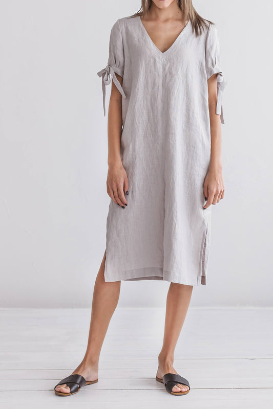 Grey linen midi dress front view with V-neck and tie-sleeves, handmade linen dress slow fashion