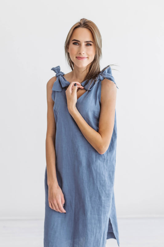 Jeans blue linen dress standing in natural pose looking forward showing relaxed fit, handmade linen dress slow fashion