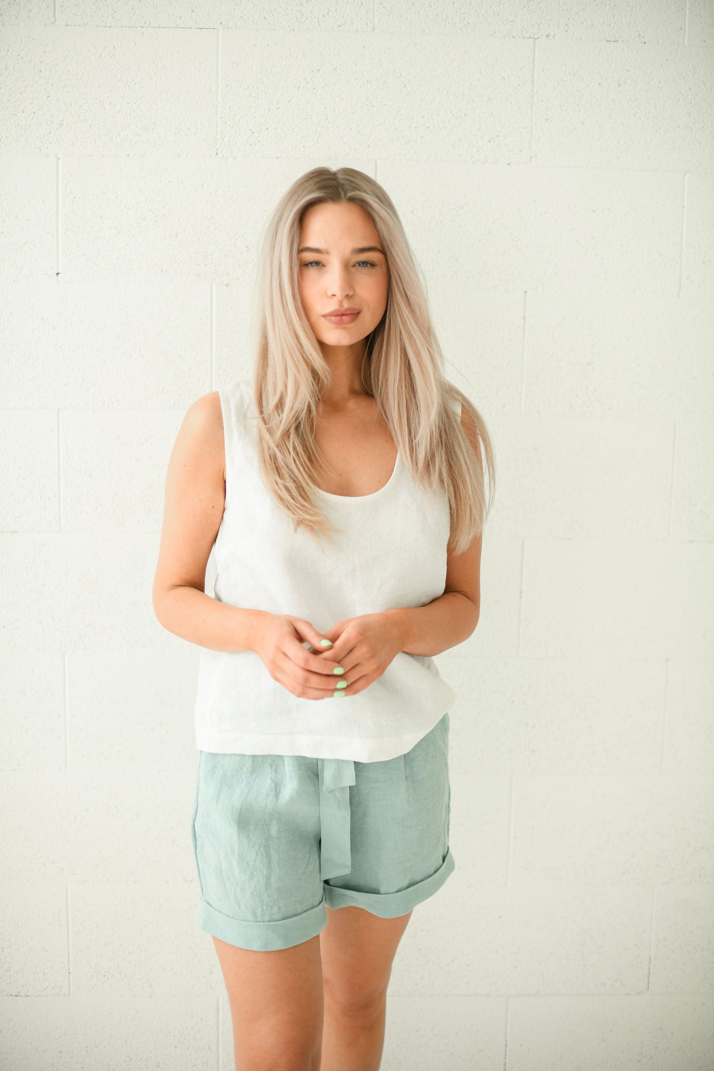 Abigail white linen sleeveless top with linen shorts close up front view