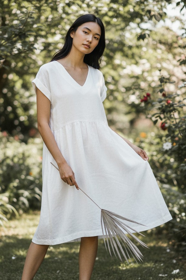 Alice linen dress – wide skirt detail, natural drape, nature background