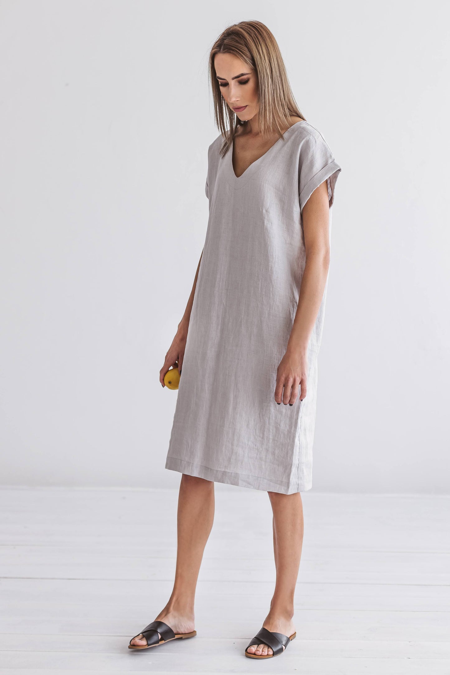 Standing pose of linen midi dress highlighting the relaxed fit and natural movement of the fabric.