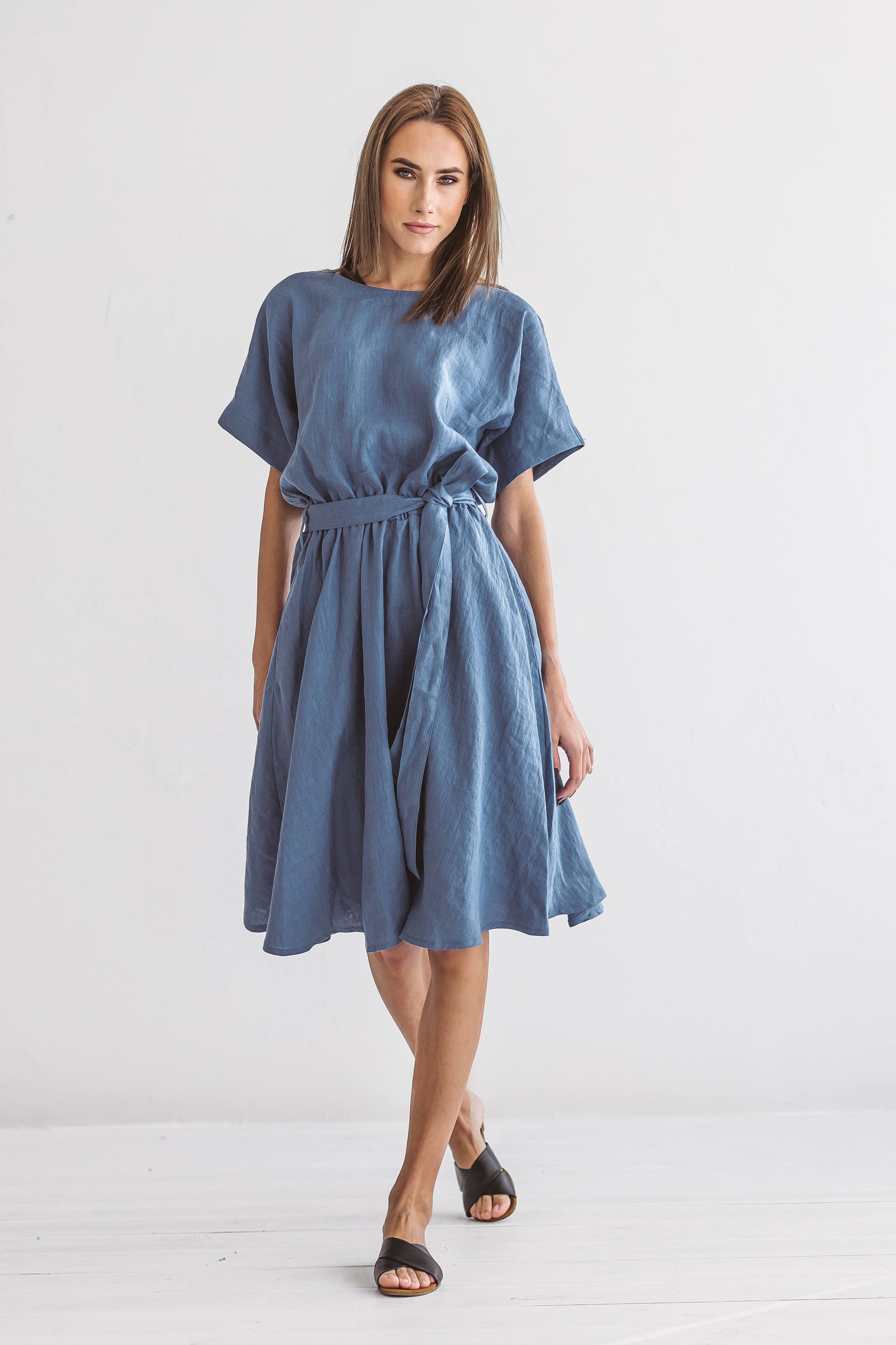 Close-up of the Kate linen dress highlighting round neckline and soft linen texture