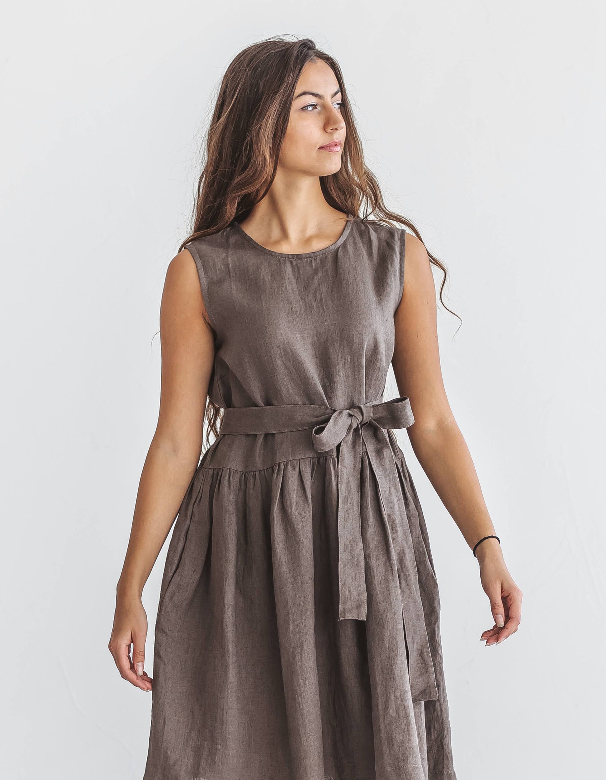 Front view of the Kelly linen dress in beige, photographed in natural light with soft A-line silhouette