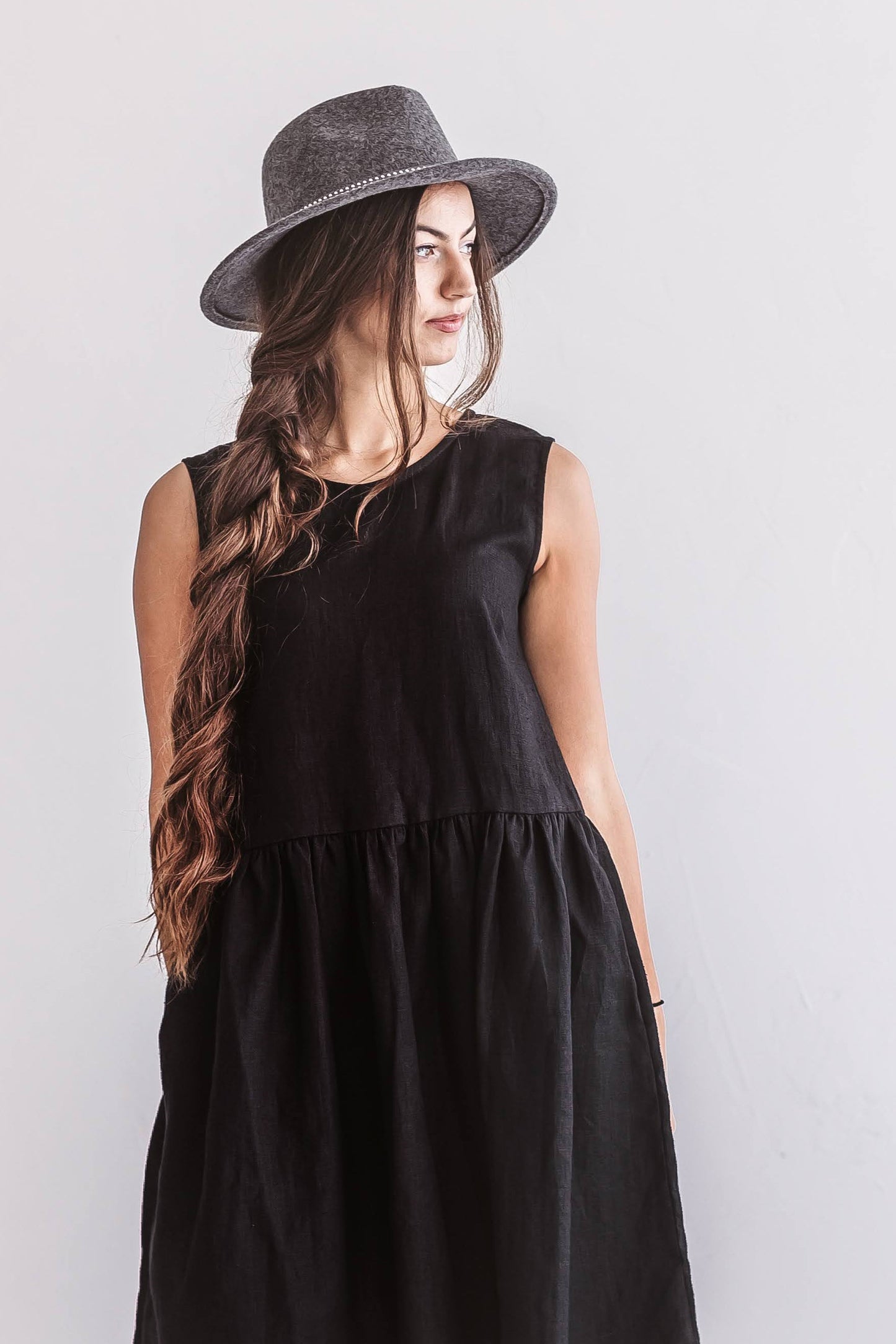 Back view of the Kelly linen dress showing A-line silhouette and wide straps