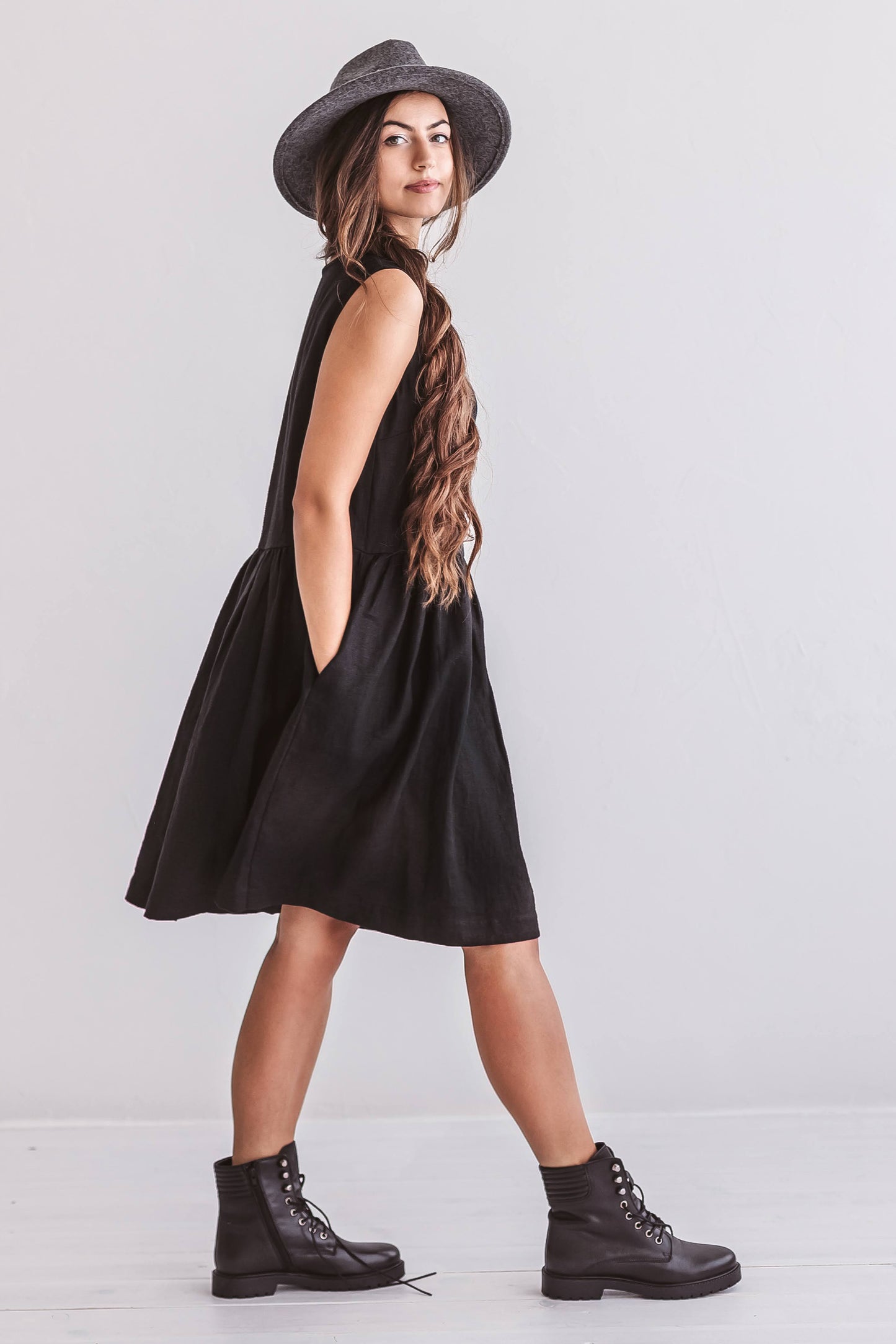 Model walking in the Kelly linen dress showing natural movement of the flared skirt