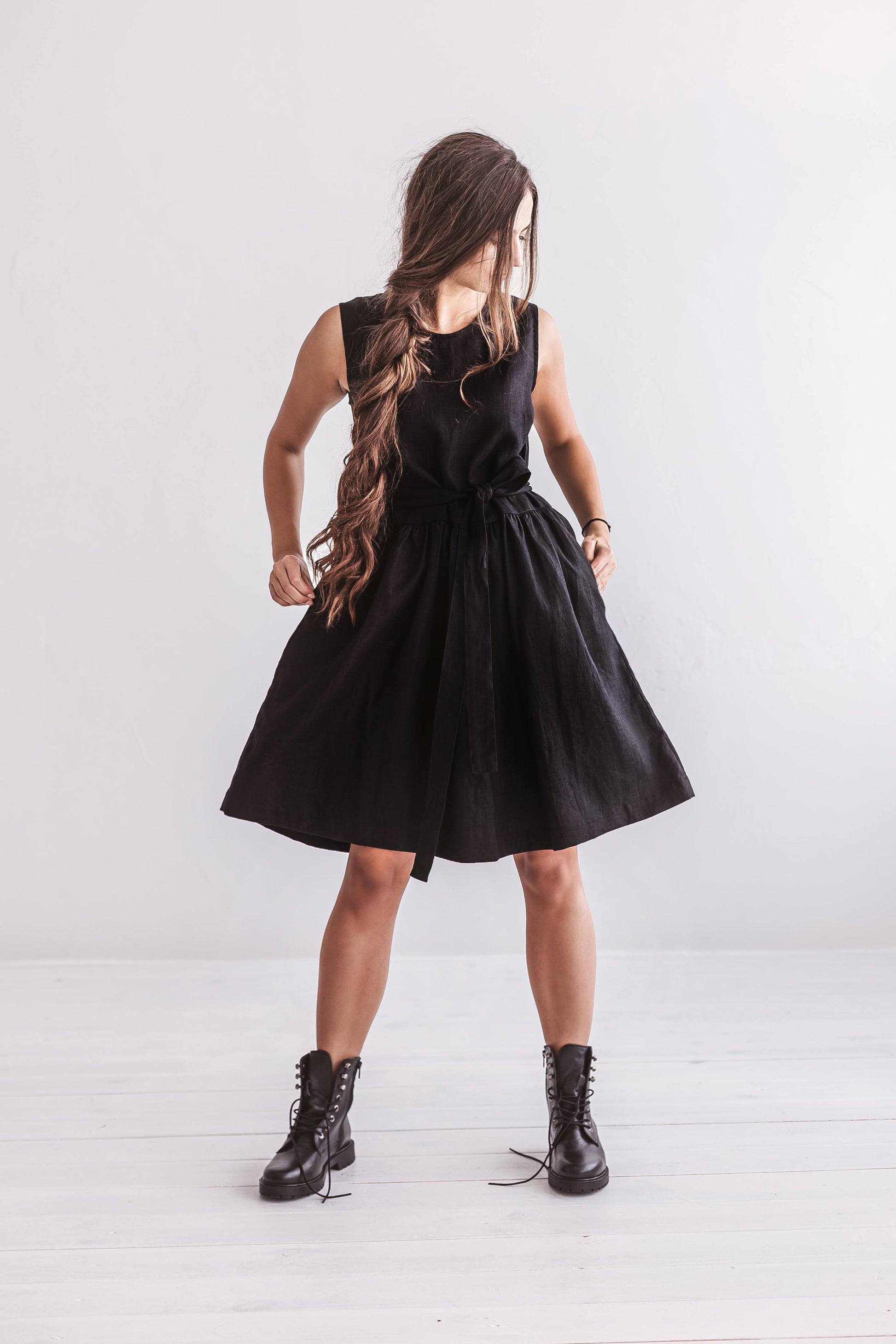 Side-angled view of the Kelly linen dress highlighting relaxed drape and airy structure