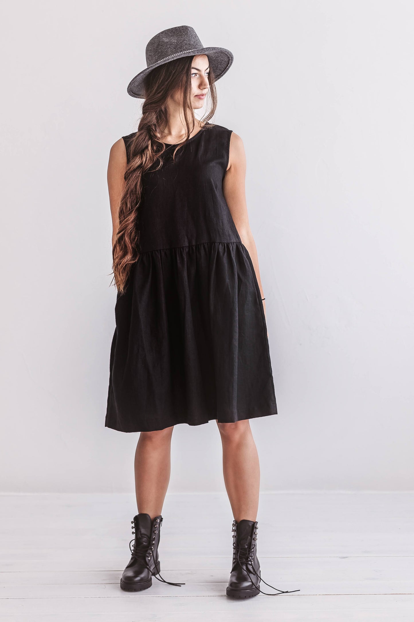 Side view of the Kelly linen dress showing movement and fabric flow