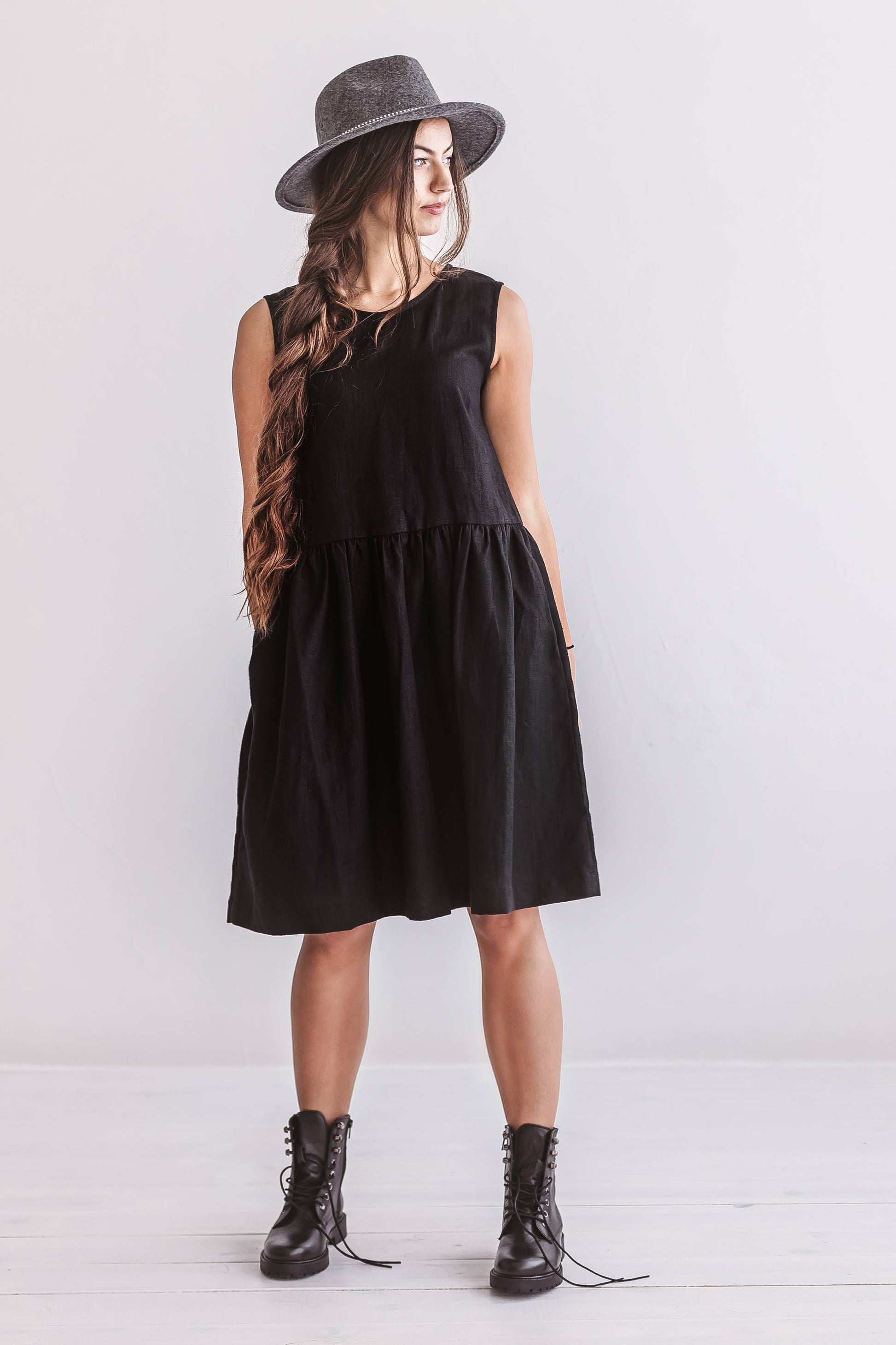 Side view of the Kelly linen dress showing movement and fabric flow