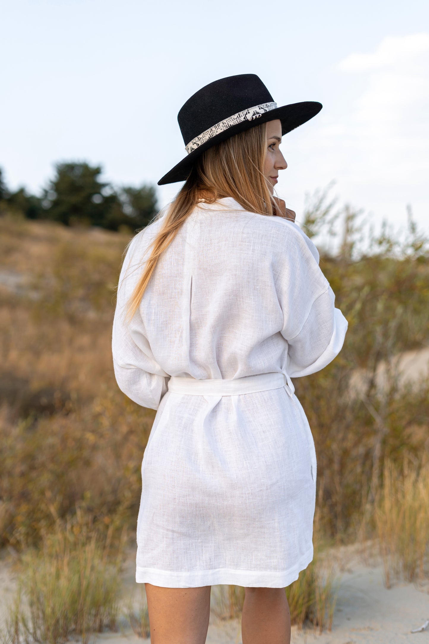 Back view of the Lauren linen robe showing relaxed silhouette and adjustable belt