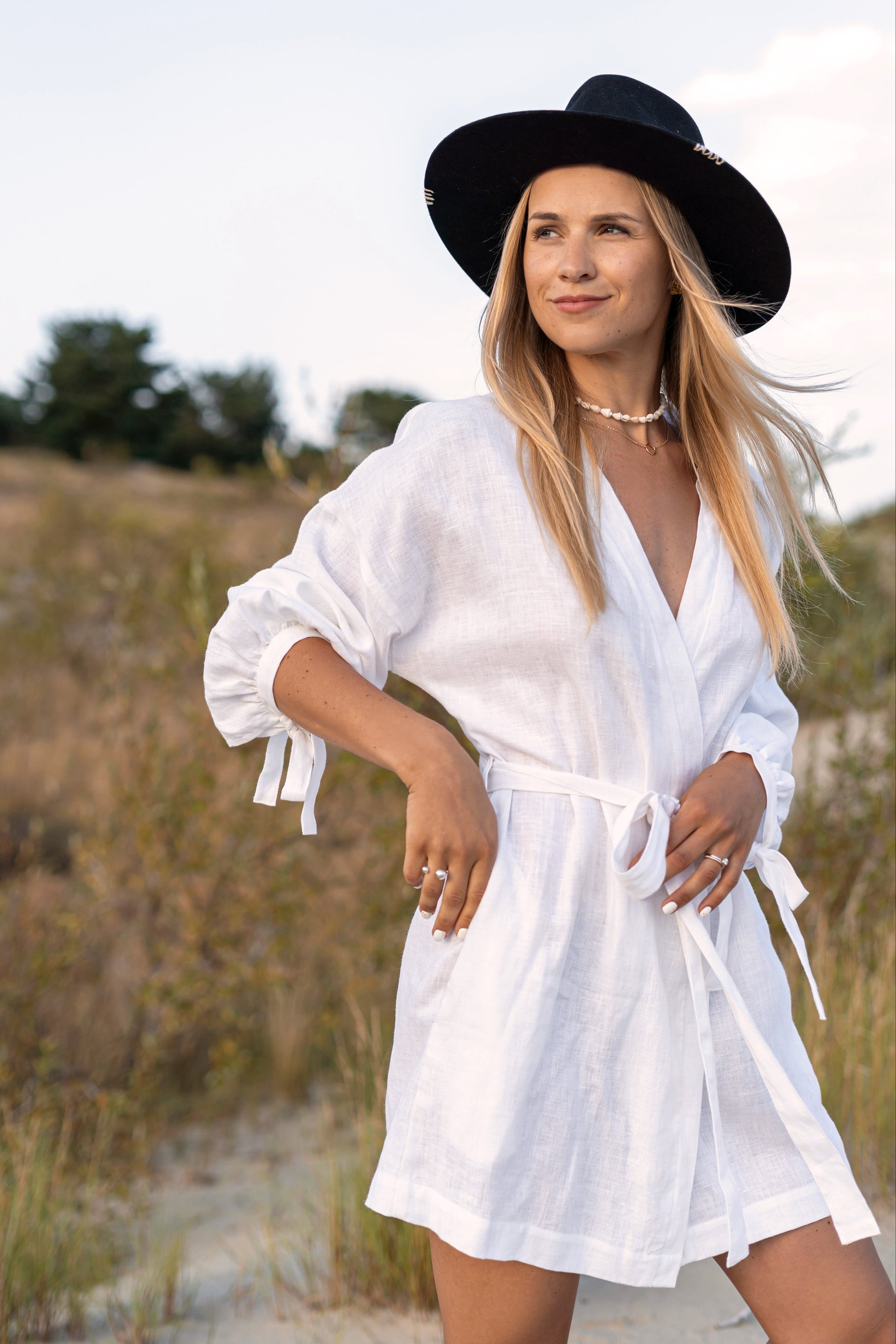 Outdoor portrait of the Lauren linen robe with clean wrap lines and tied waist