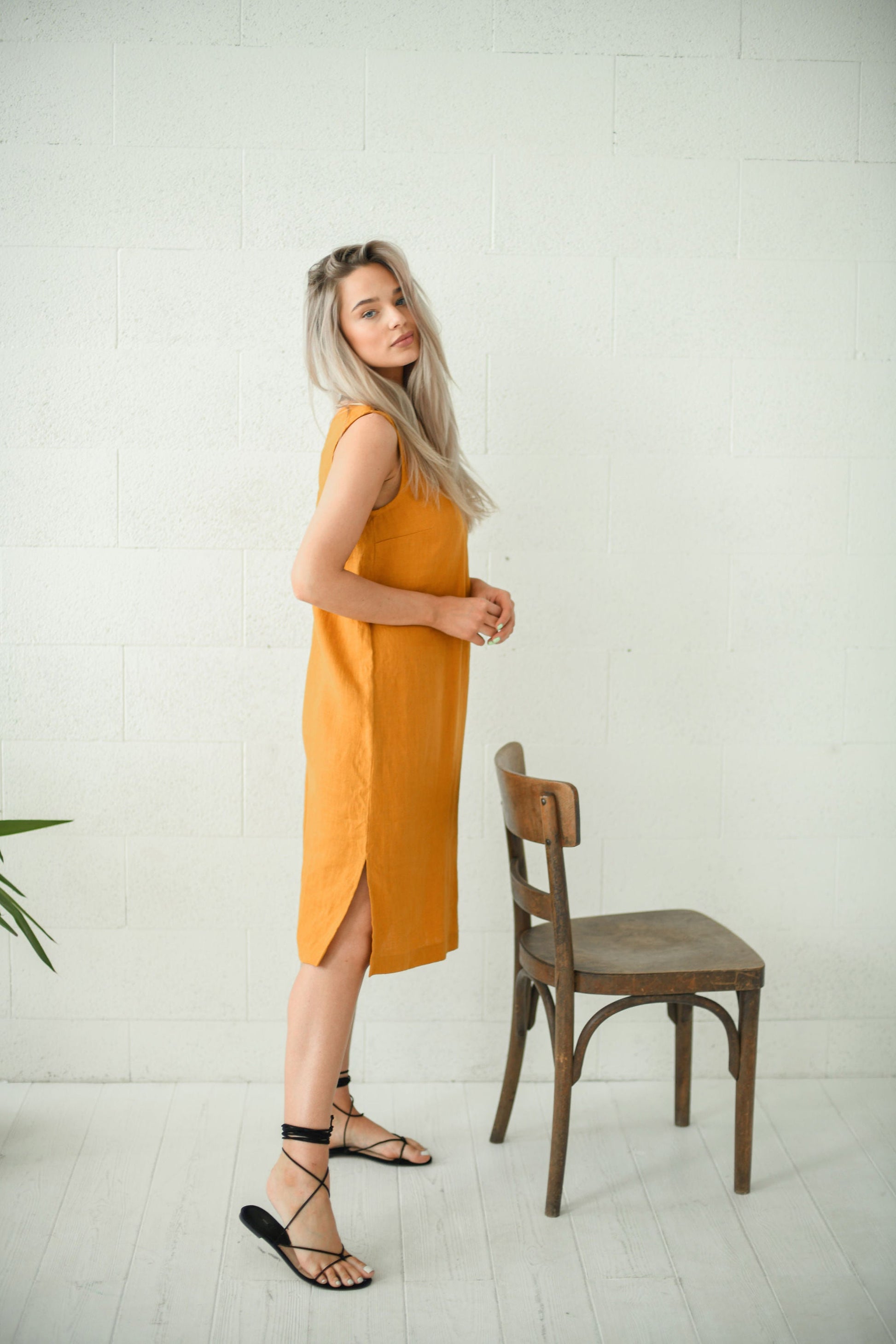 AVERY mustard linen midi dress three quarter studio view handmade linen dress slow fashion