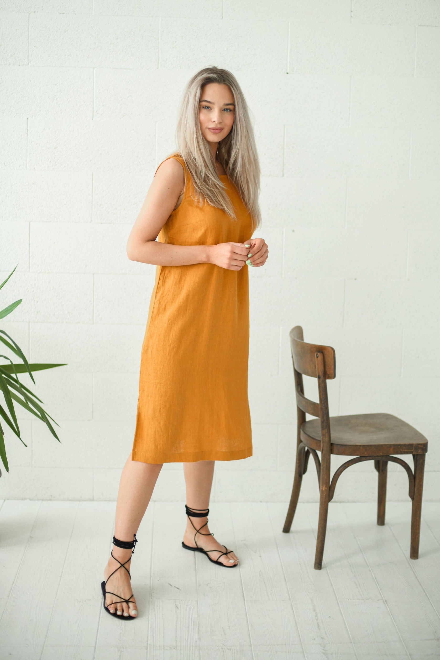 AVERY mustard linen midi dress walking with chair handmade linen dress slow fashion