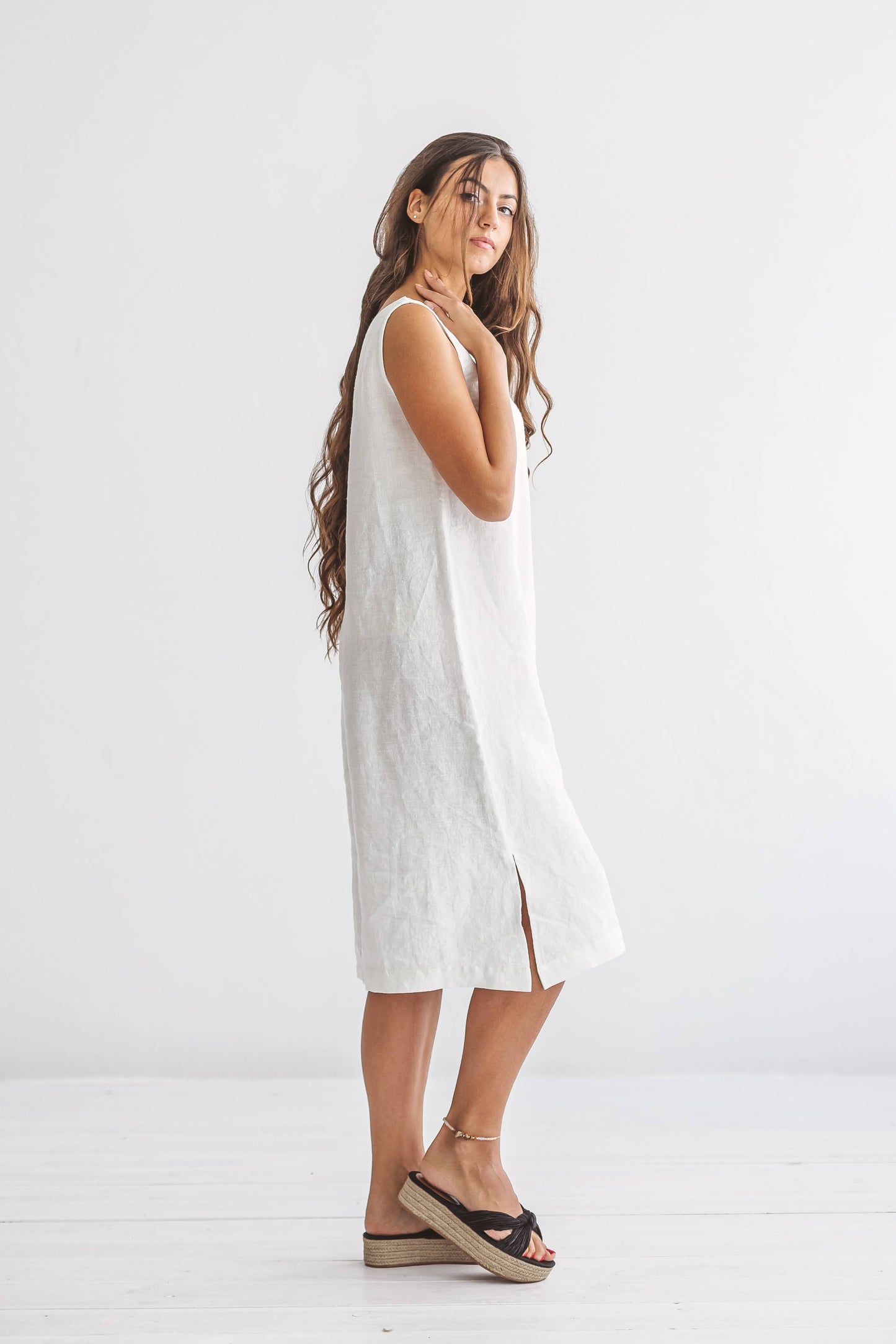 AVERY white linen midi dress walking front studio view handmade linen dress slow fashion