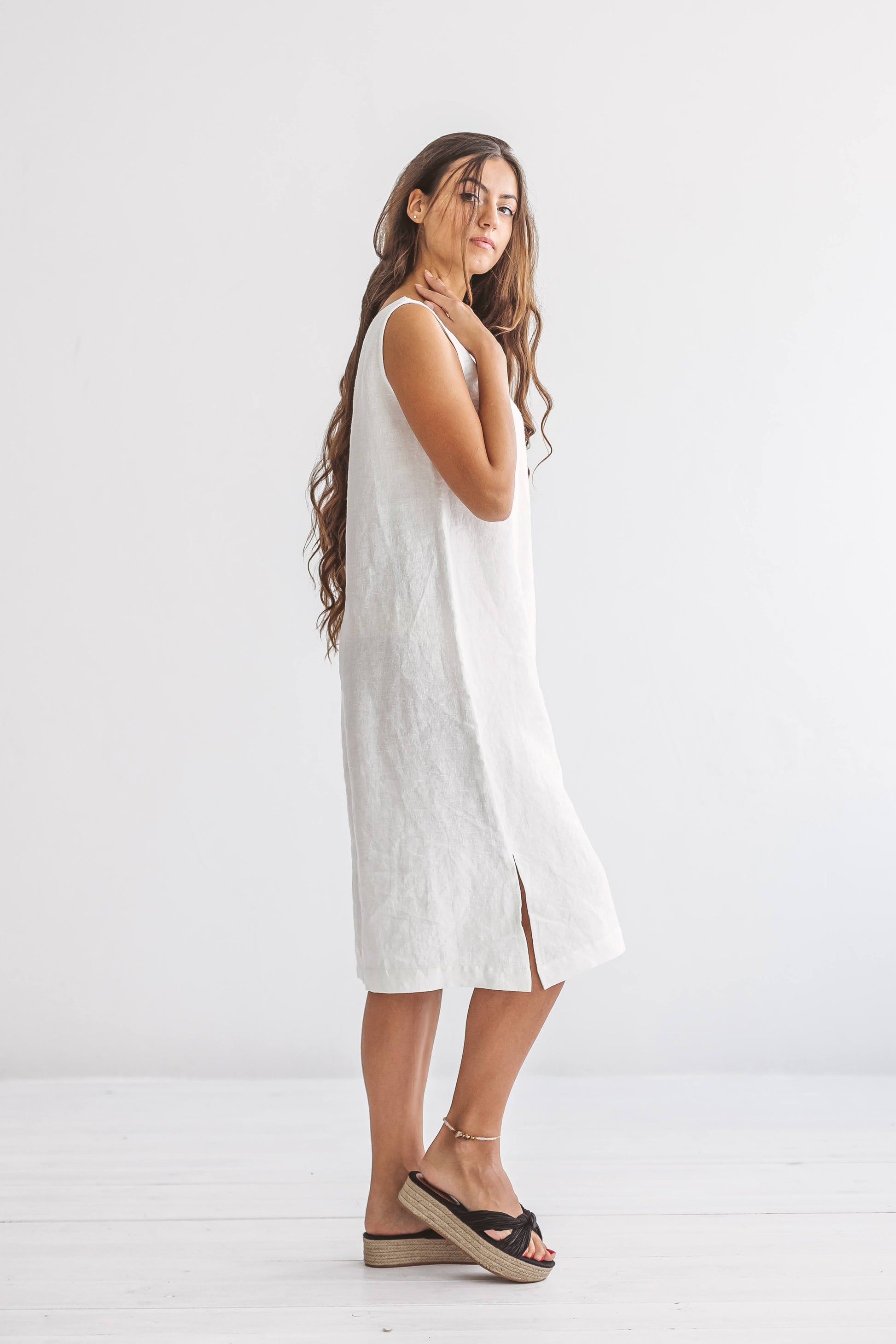 AVERY white linen midi dress walking front studio view handmade linen dress slow fashion