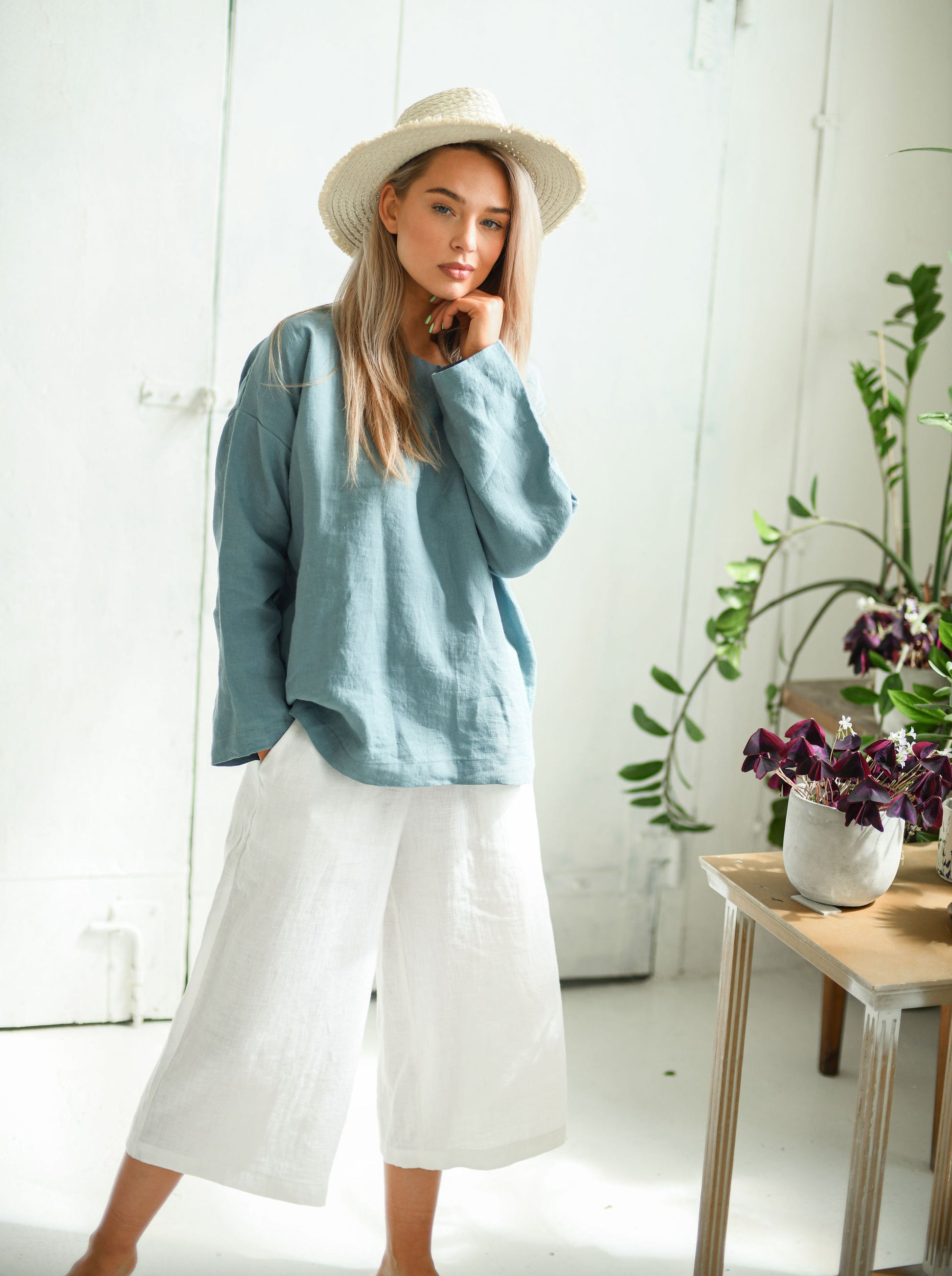 White linen pants full-body view with loose linen top showing relaxed styling, handmade linen pants slow fashion