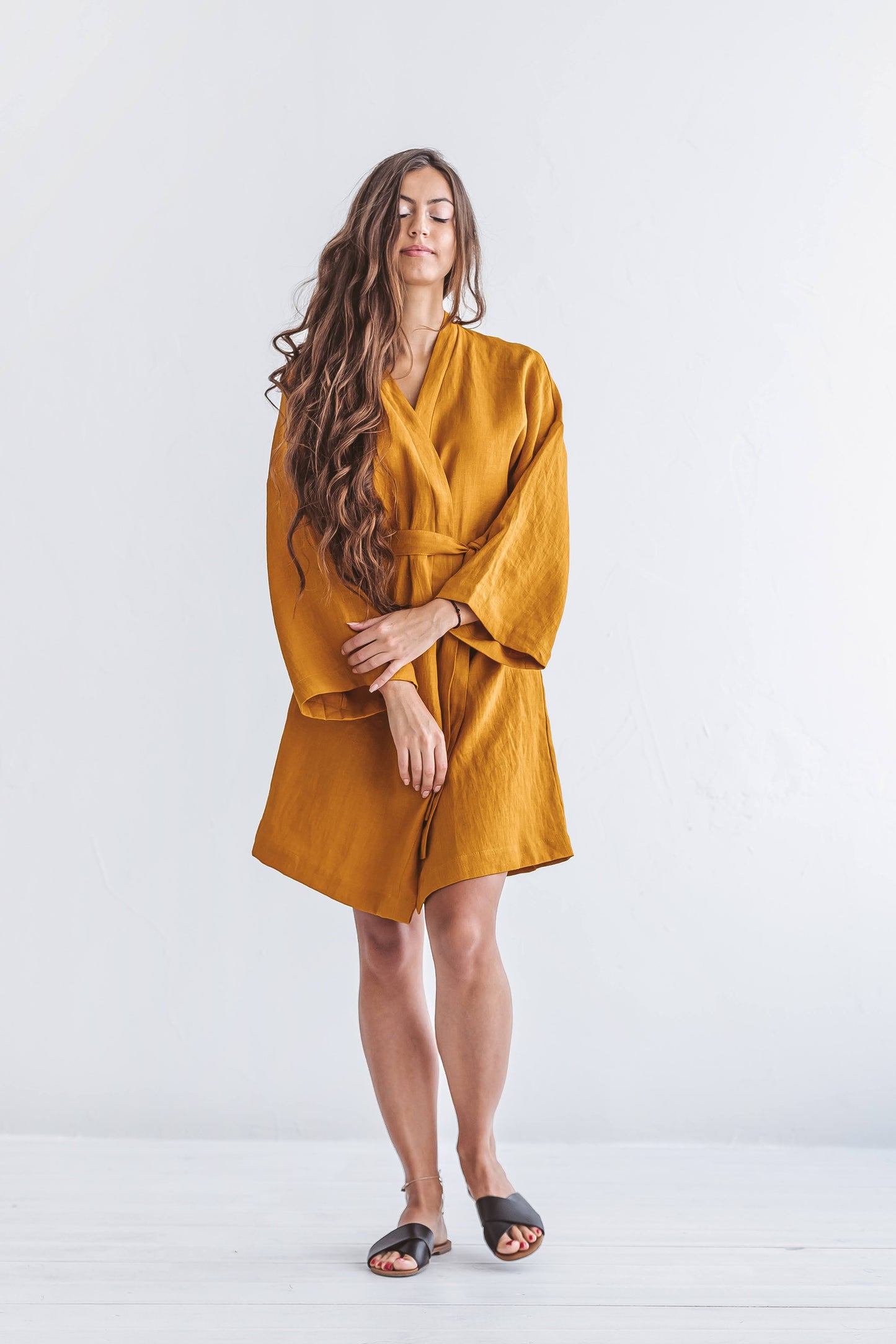 Mustard linen robe front view showing kimono-style wrap, handmade linen robe slow fashion