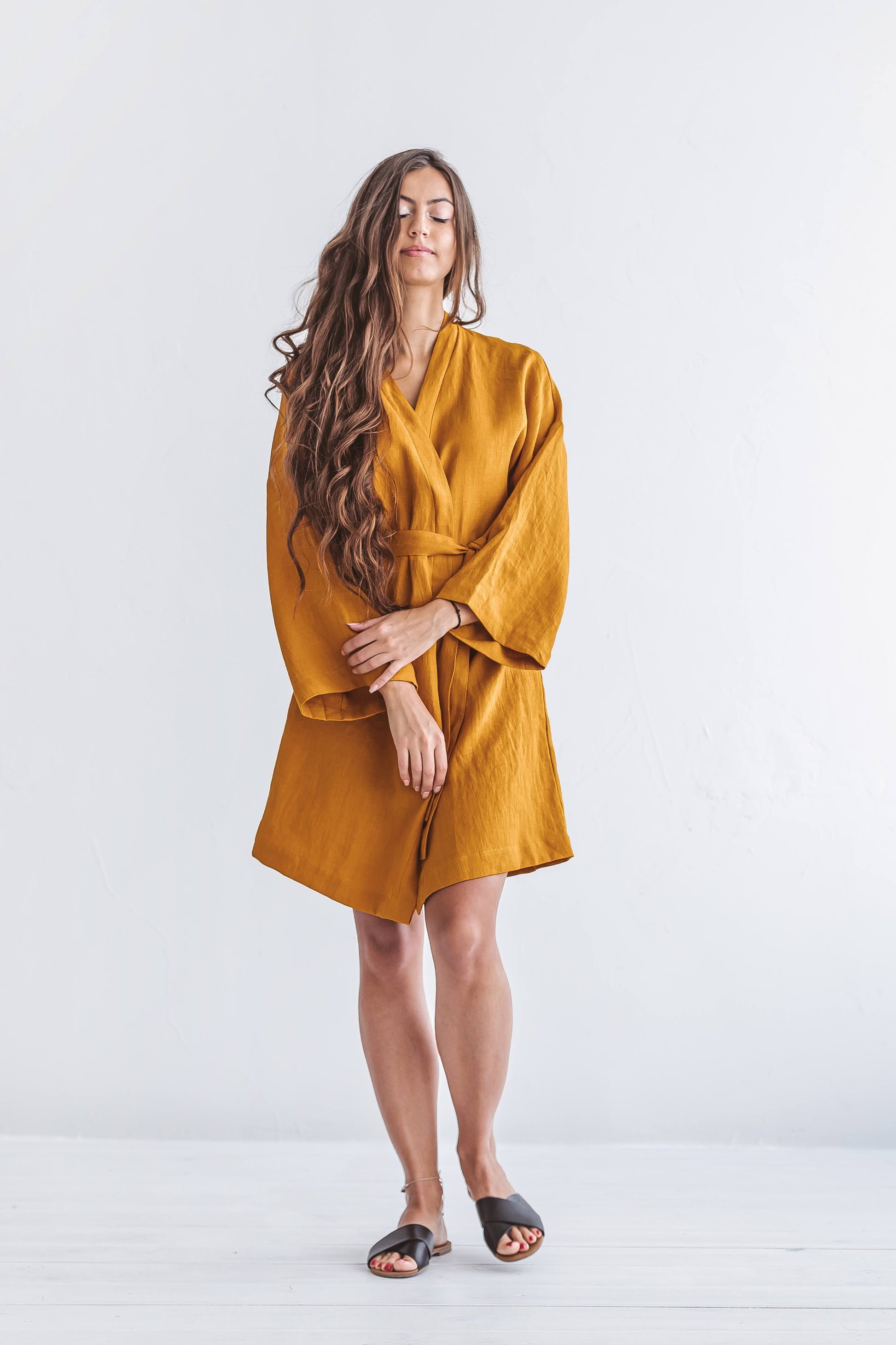 Mustard linen robe front view showing kimono-style wrap, handmade linen robe slow fashion