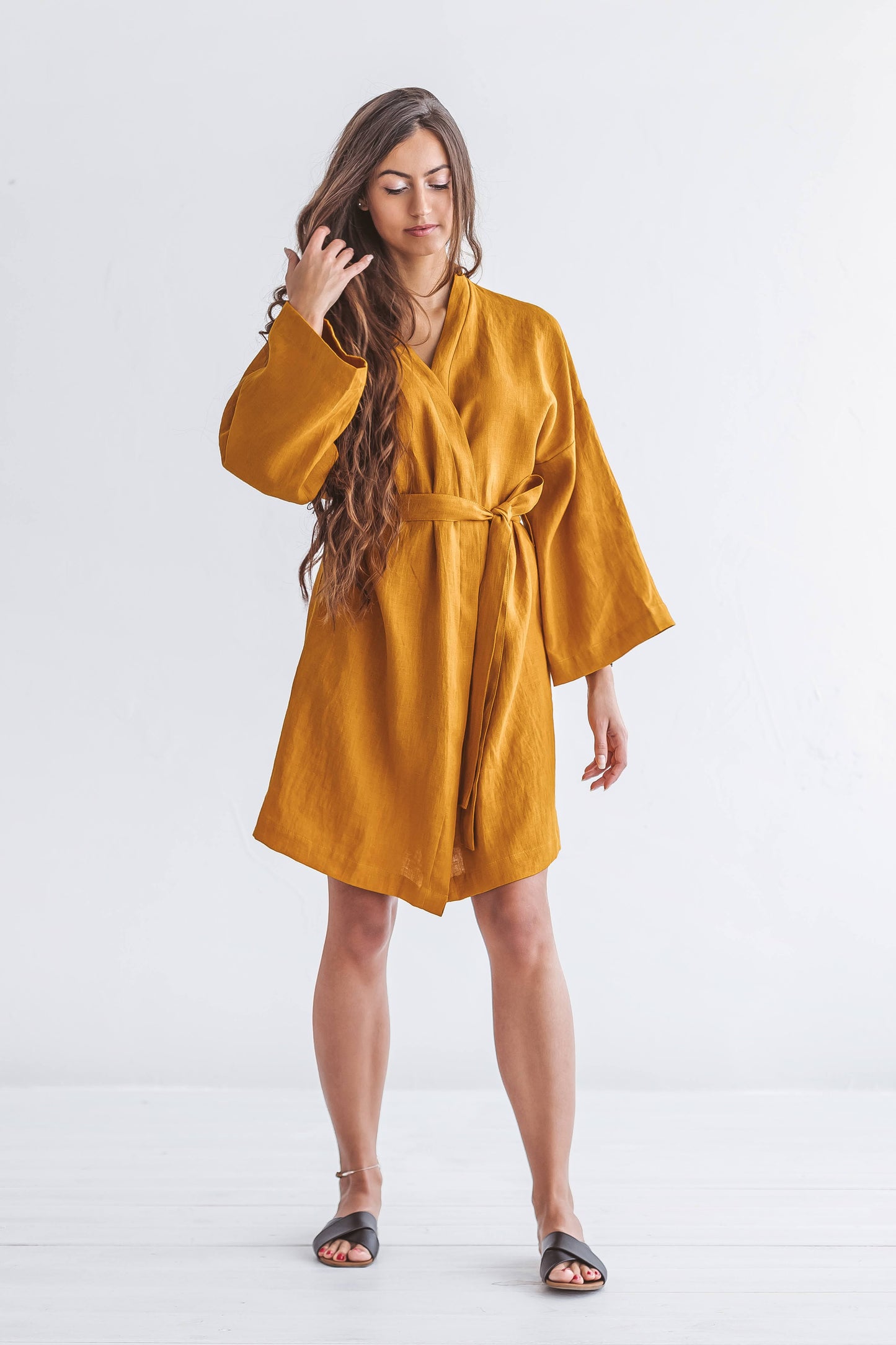 Mustard linen robe full-body view showing wrap-style design, handmade linen robe slow fashion