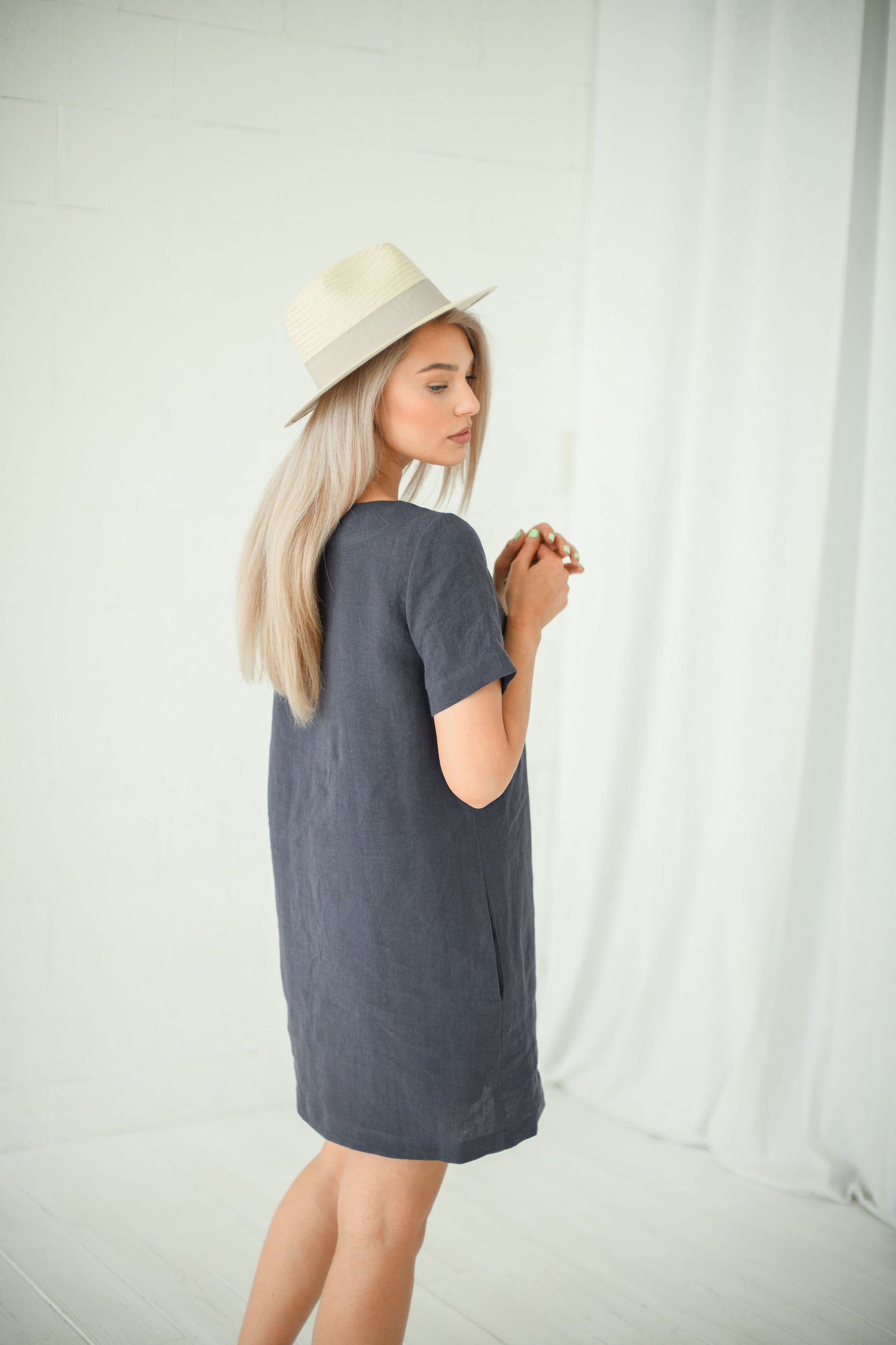 Graphite grey linen dress detail studio view showing square neckline, handmade linen dress slow fashion