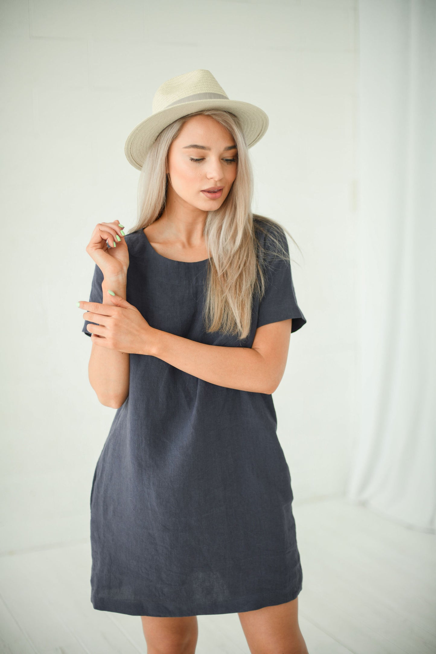 Graphite grey linen dress full-body studio view showing square neck and a-line silhouette, handmade linen dress slow fashion