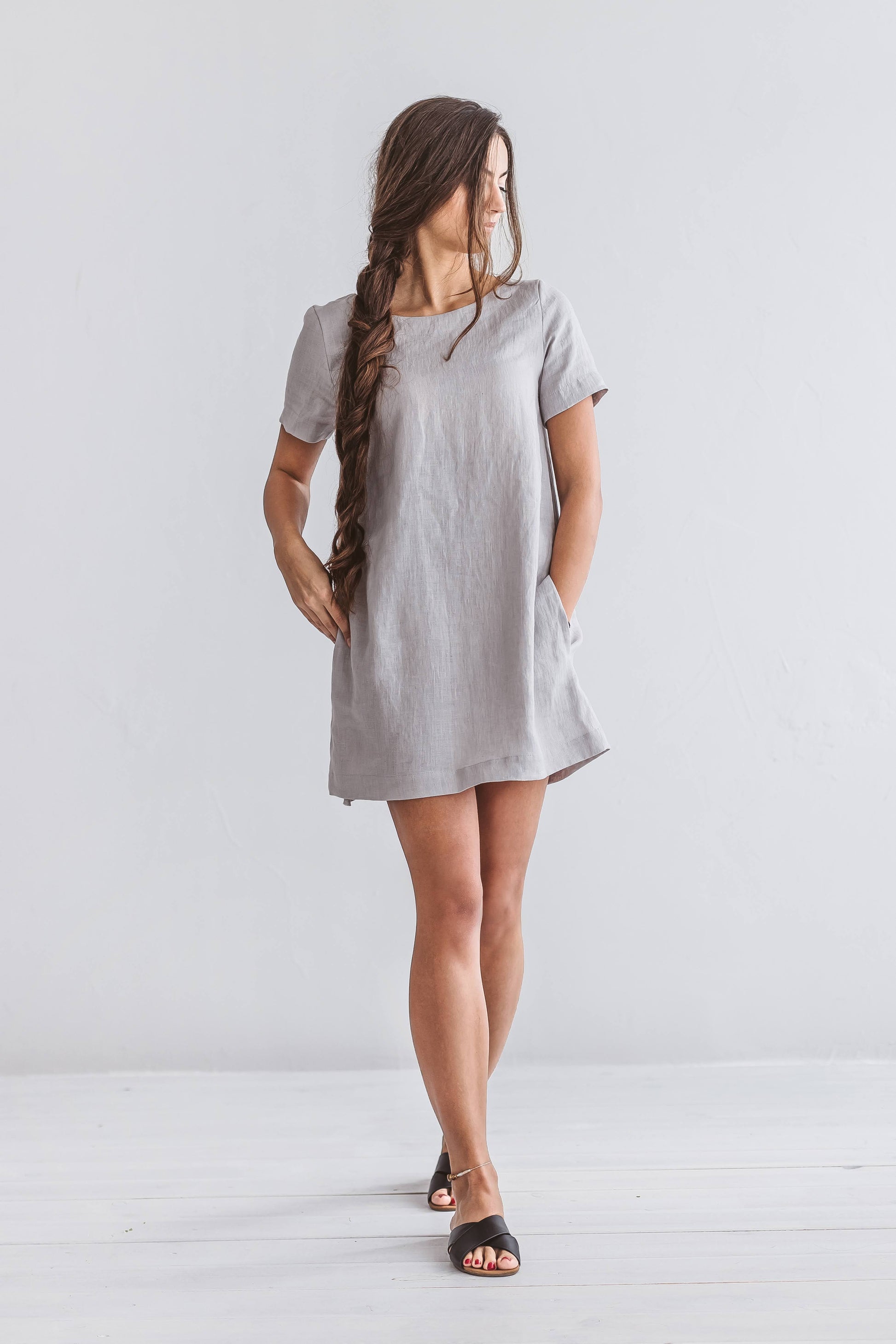 Grey linen dress studio portrait showing relaxed fit and short sleeves, handmade linen dress slow fashion