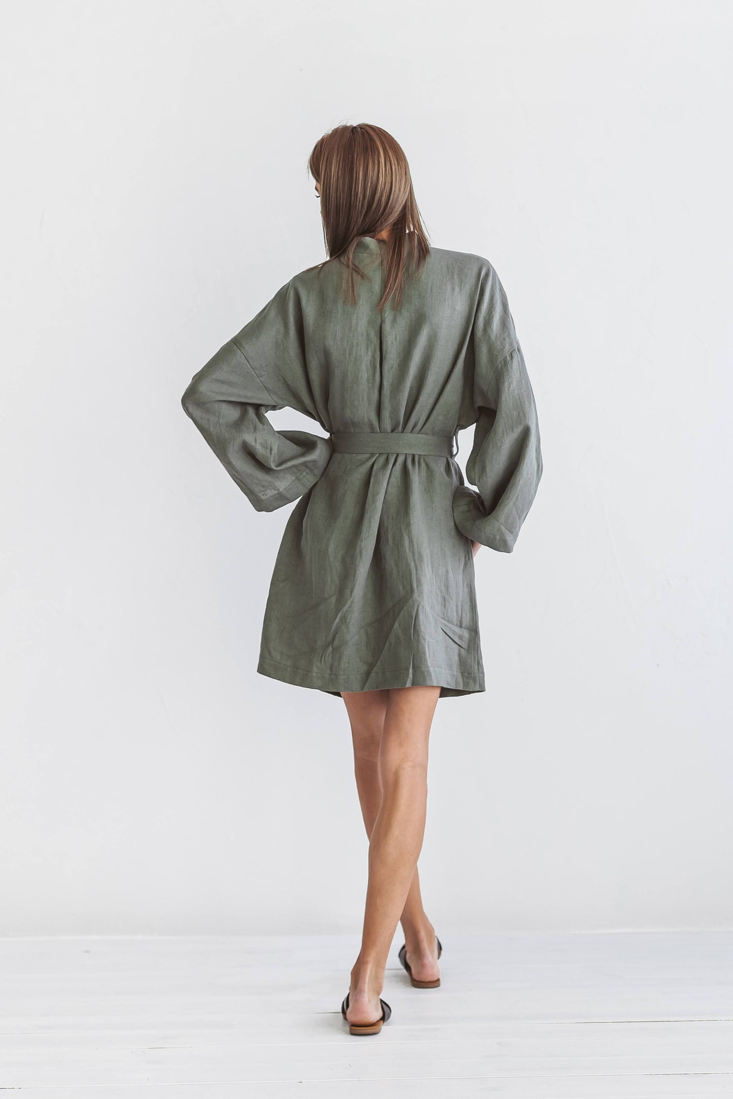 Khaki linen robe back view showing kimono-style wrap design, handmade linen robe slow fashion