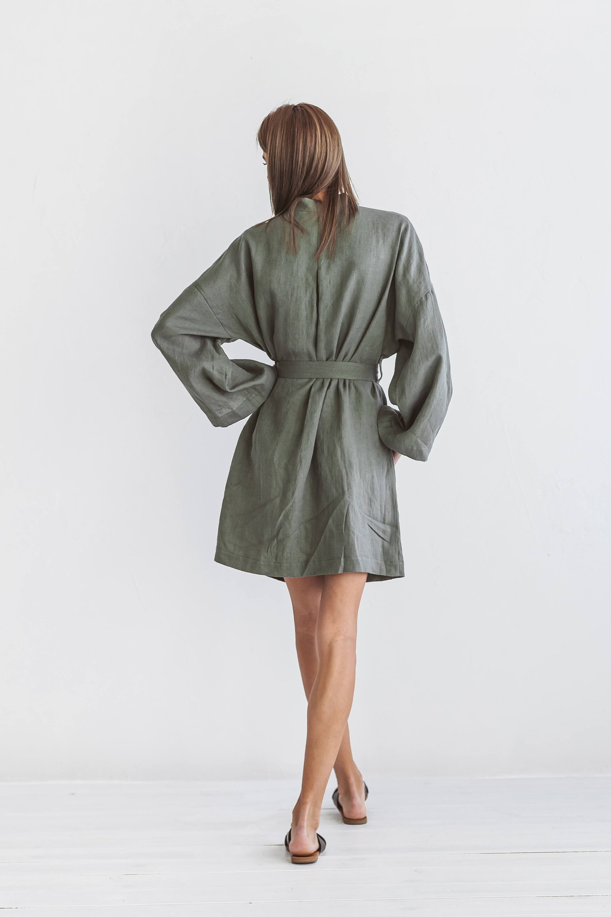Khaki linen robe back view showing kimono-style wrap design, handmade linen robe slow fashion