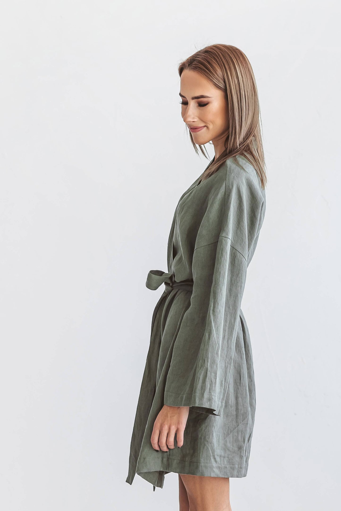 Khaki linen robe side view showing relaxed silhouette, handmade linen robe slow fashion